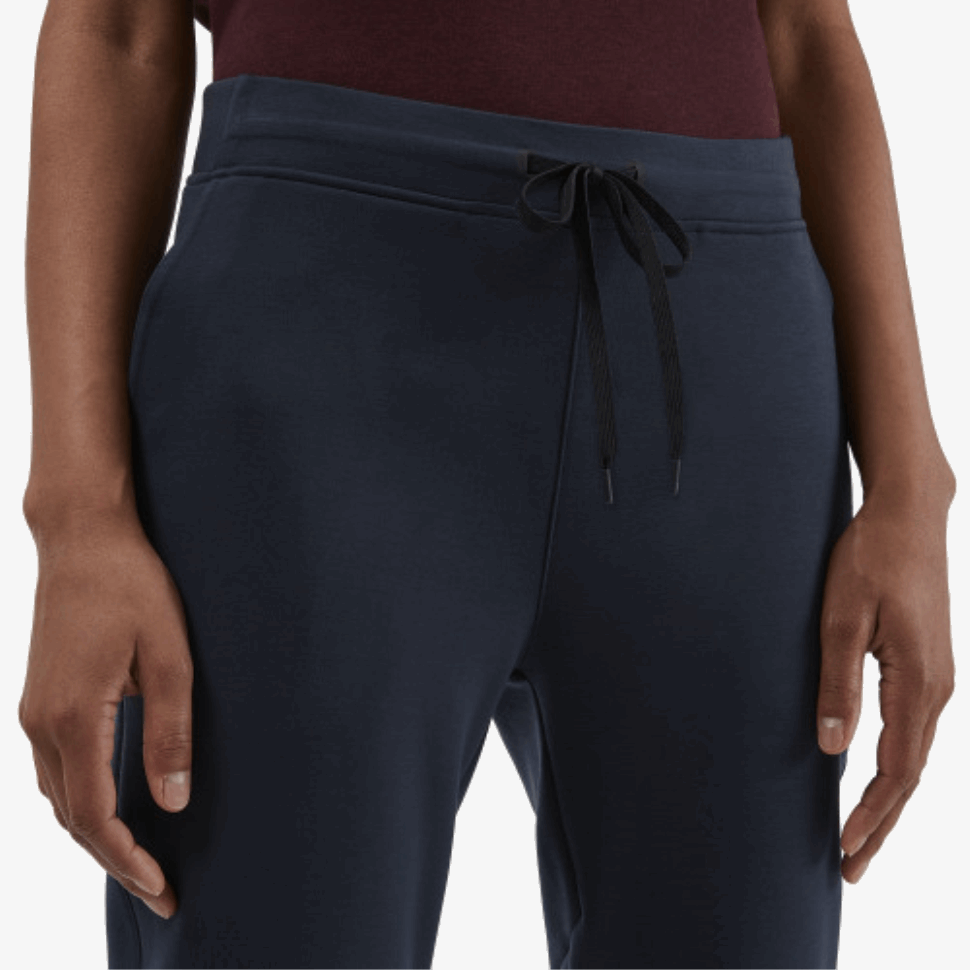 Sui Pantaloni Della Tuta Da Corsa Blu Scuro