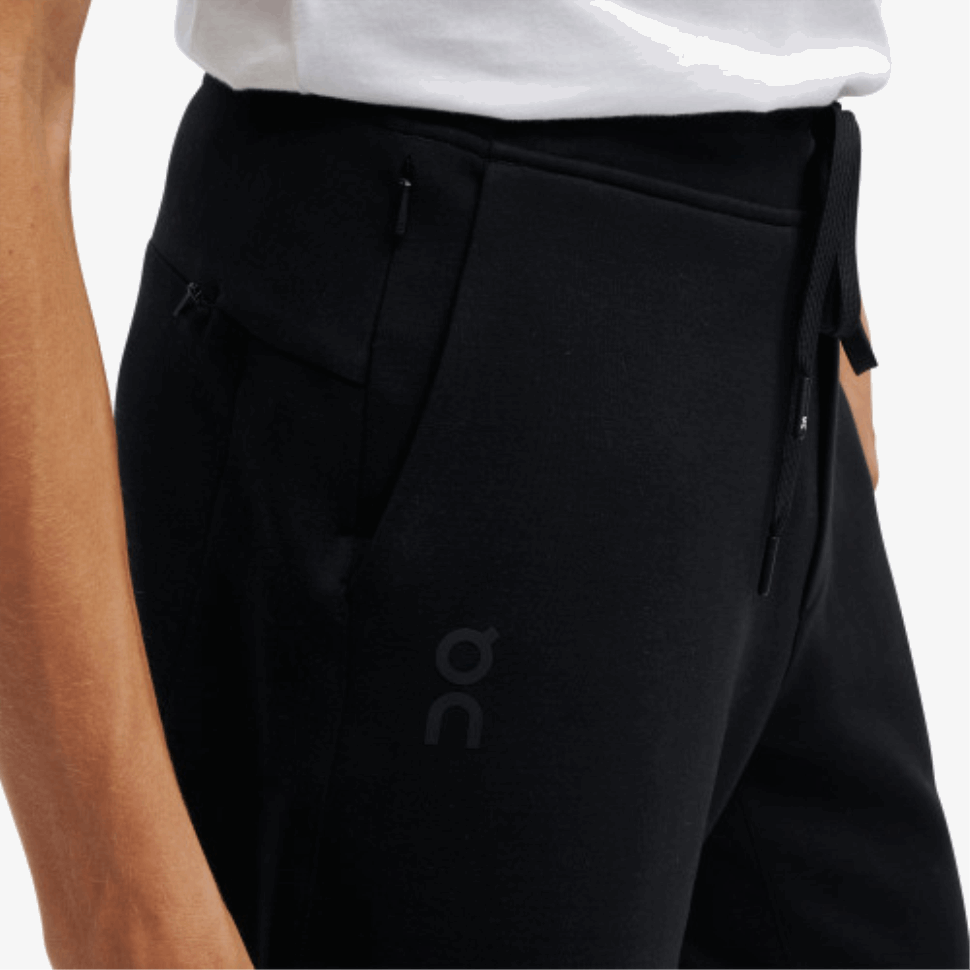 Sui Pantaloni Della Tuta Da Corsa Neri