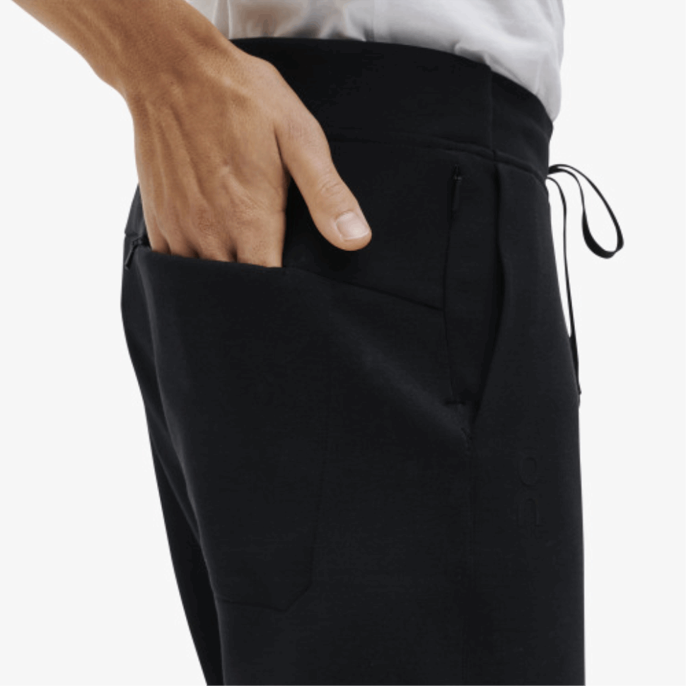 Sui Pantaloni Della Tuta Da Corsa Neri