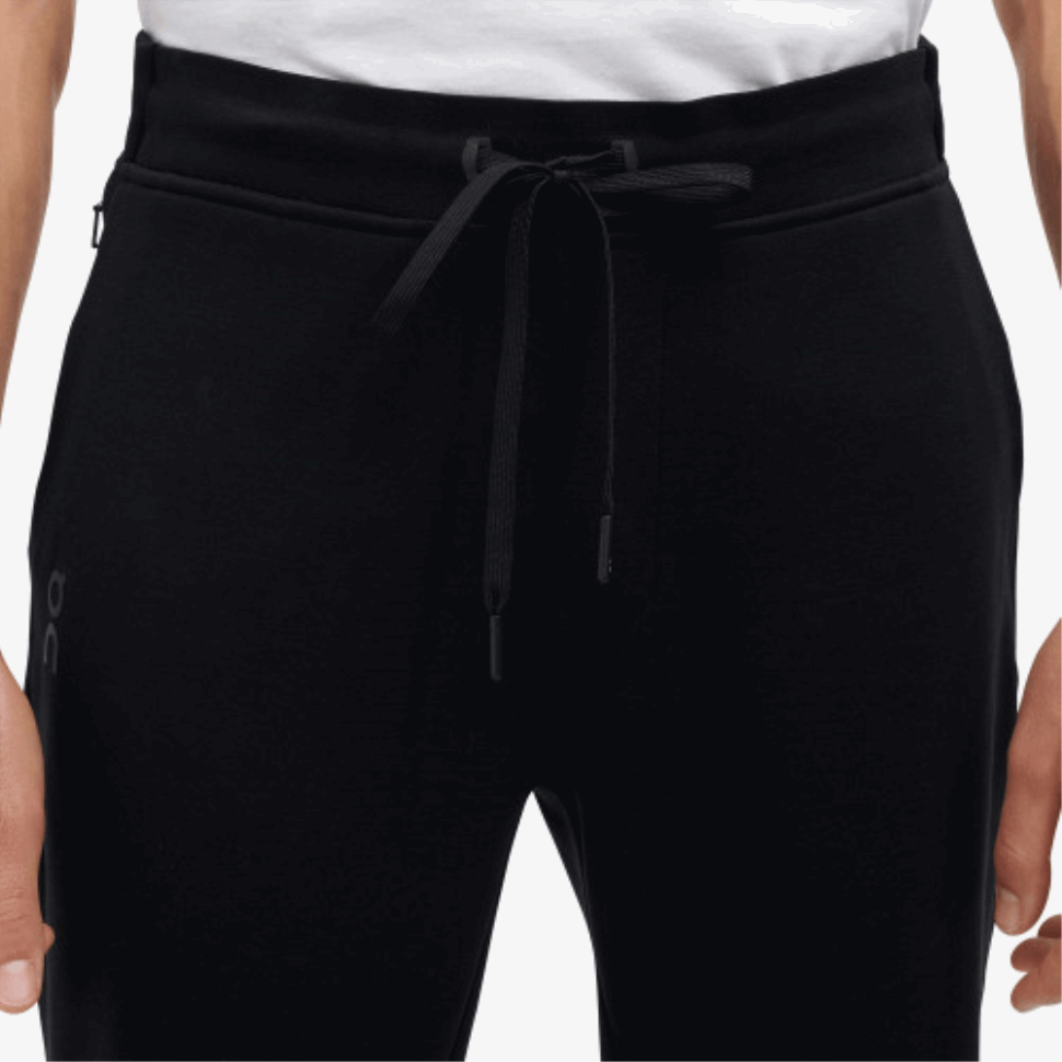 Sui Pantaloni Della Tuta Da Corsa Neri